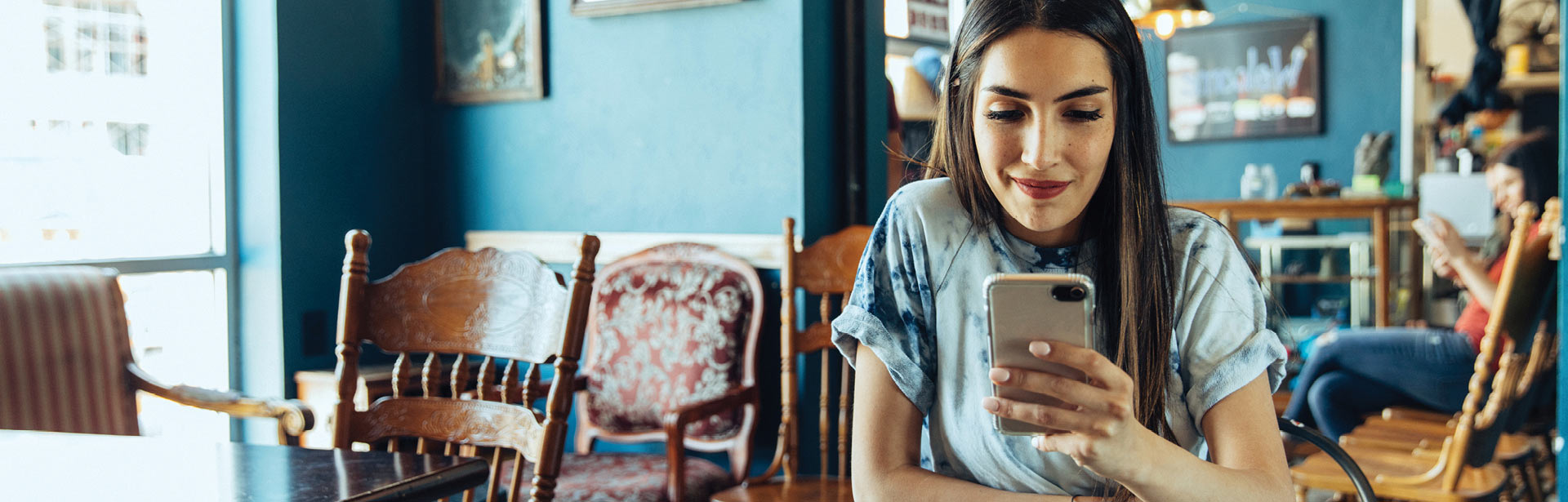 Happy lady using online mobile banking