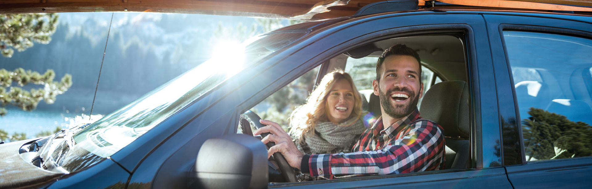 Very happy couple on a road trip